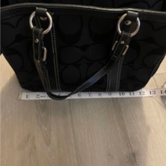 It’s a large signature C coach logo printed all over it - Picture 15 of 15